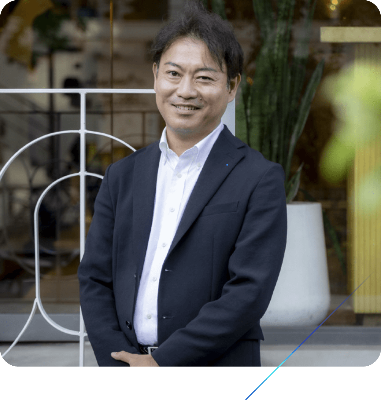 Subaru marketing professional smiling in a business suit