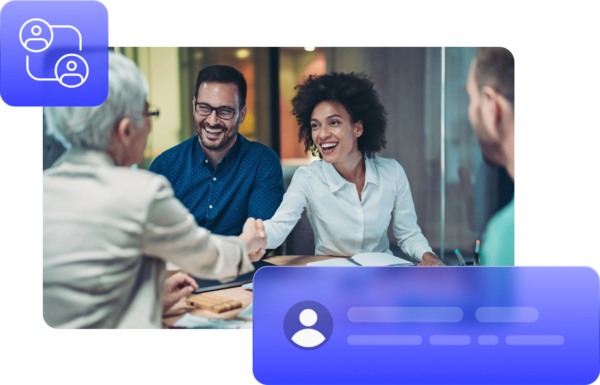 People smiling, talking, and shaking hands in a meeting room during a partner certification session.